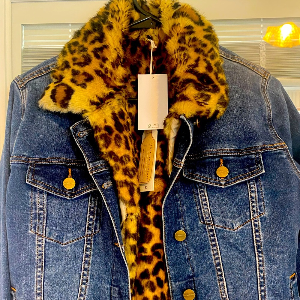 Elegant denim jacket with removable animal print interior